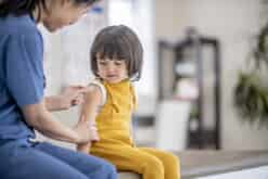 child at the doctor getting a bandaid