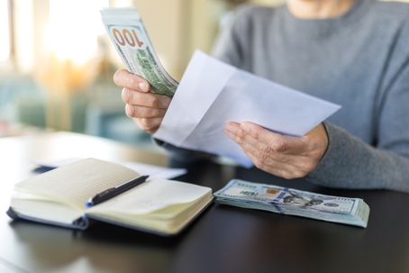 person budgeting money