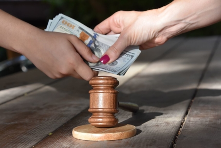 passing money in front of gavel